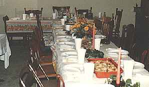 <A table set ready for the family to come and eat.>